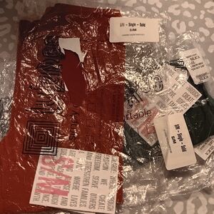 Lularoe Kid LEGGINGS Size S/M Fits 2 to 8 Rust and Green. 2 In Bundle